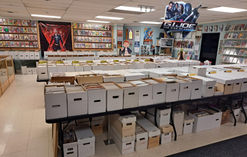 Awesome Comics, Dallas' Premiere Comic Shop with our new Secret Headquarters, 10% off walk-in special on everything in the store, excluding sale items. Subscription subscribers get 20% off all new comics, and 15% off everything else in the store not already on sale.